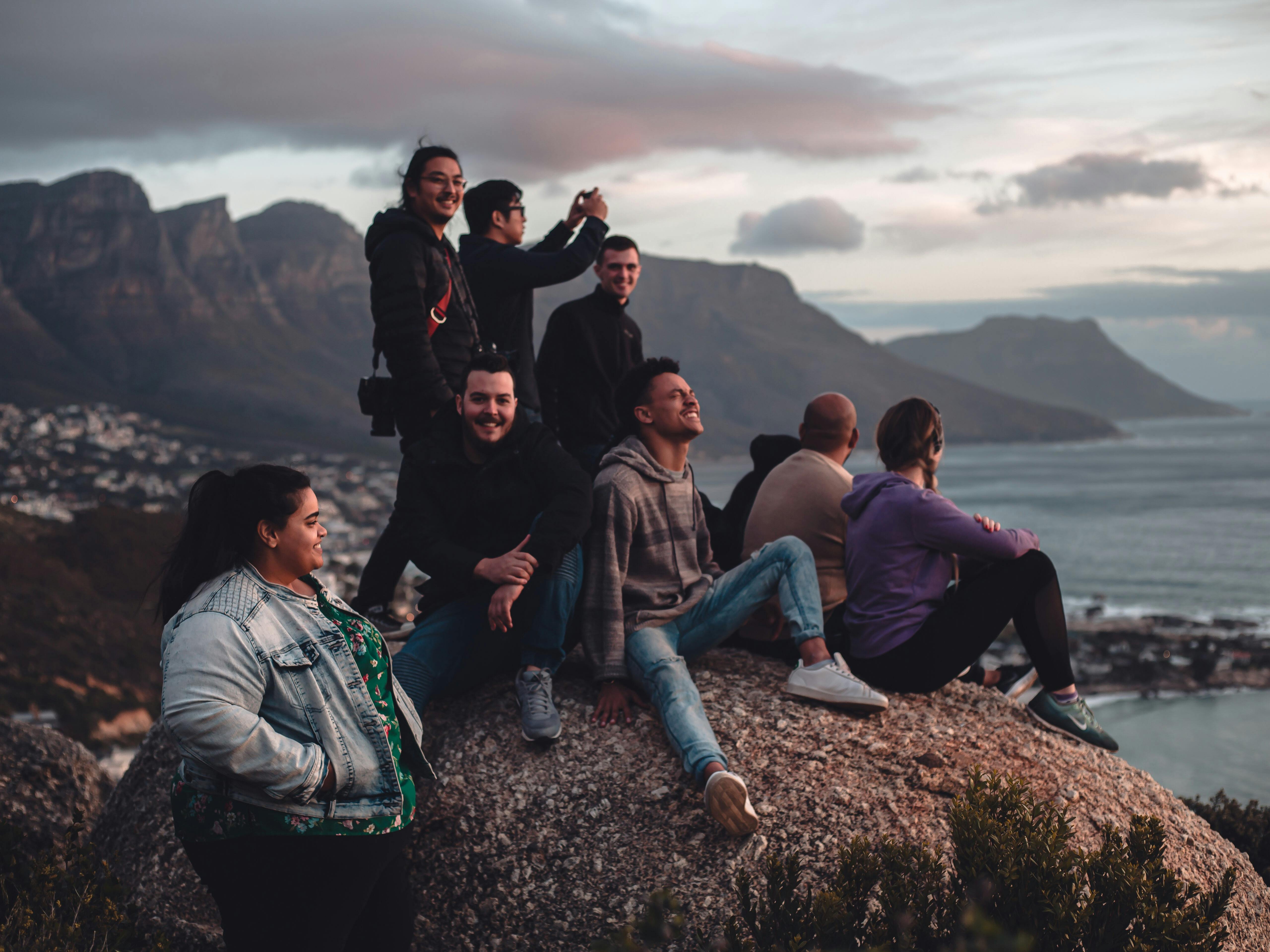 Hikers on the mountain top connecting with nature